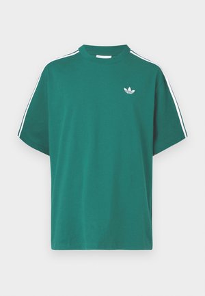 Zelené bavlněné tričko s vysokým límcem, krátkými rukávy a bílými pruhy po stranách. Na hrudi má malé bílé logo.