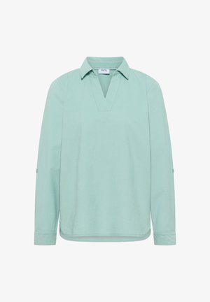 Blouse à manches longues vert clair avec col en V ouvert et pattes de boutonnage sur les manches, en tissu léger avec une coupe décontractée.
