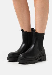 s.Oliver - Platform ankle boots - black Thumbnail Image 1
