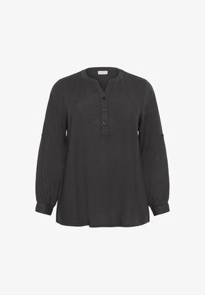 Melna, ar garām piedurknēm, krekls no viegla auduma. Ar V veida kakla izgriezumu un pogu apli, kas sastāv no trim pogām. Savilktas piedurknes un sānu šķēlumi.