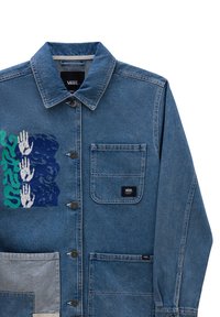 Denim jacket in blue featuring a large graphic of hands in white and green, chest pocket, and Vans logo tag on the lower pocket.
