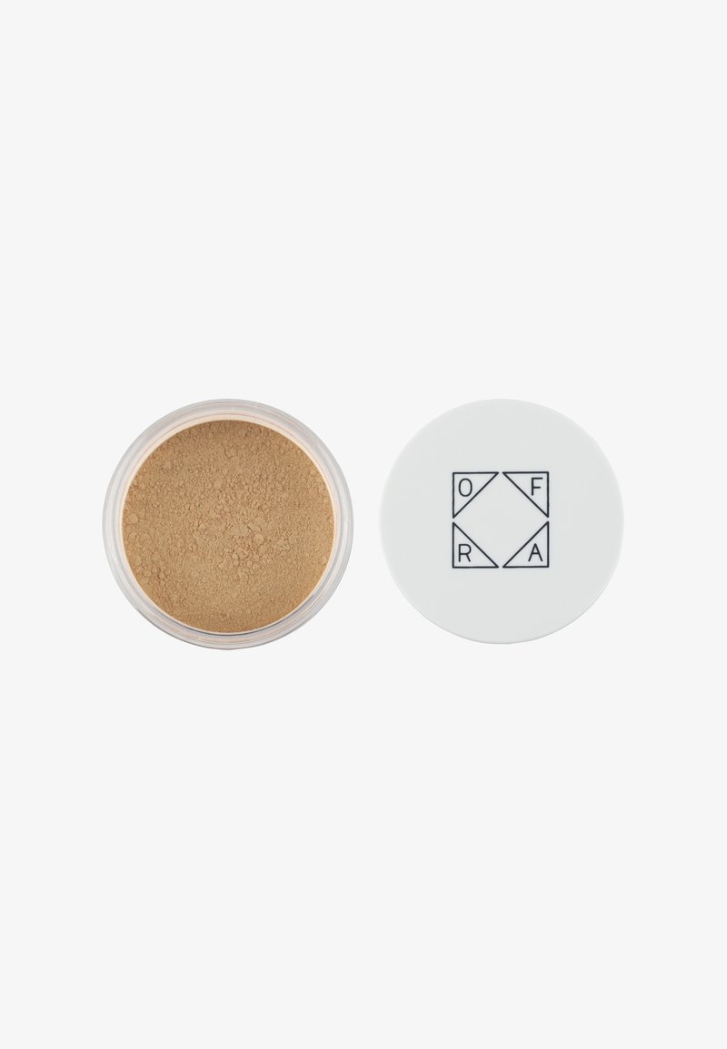 Loose beige face powder in a round clear container with a white lid featuring a black geometric logo with letters O, F, R, A.