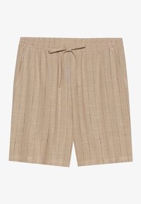 Beige linshorts med drawstring i livet, vertikale stripert mønster, og sidelommer. Stoffet har en litt strukturert utseende.