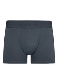 Tmavě šedé boxerky vyrobené z měkké tkaniny. Elastický pas zdobí embosované logo. Hladká textura s těsným střihem.