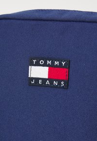 Tommy Jeans RETRO COOL REPORTER - Cross body bag - blue