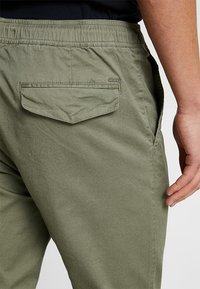 Solid SDSLIM SLIM FIT - Trousers - dusty oliv
