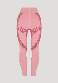 Leggings rosa con vita alta, caratterizzate da linee curve rosse che creano motivi geometrici. Realizzate in materiale liscio ed elastico.