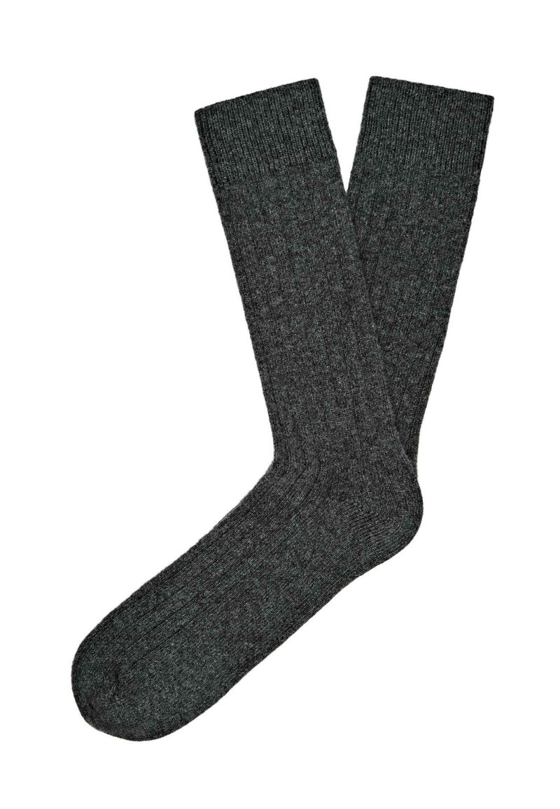 Chaussettes grises à côtes fabriquées à partir d'un tissu texturé, dotées d'un orteil et d'un poignet renforcés, avec un design classique arrivant au genou.