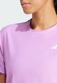 adidas Performance TEE - Sport T-shirt - preloved purple