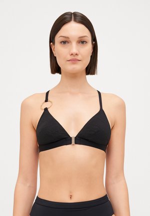 Black triangular bra with textured fabric, gold ring accent on one strap, and a front metal clasp. Straps are thin and adjustable.