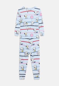 Σπίτι με φως μπλε μακρυμάνικο πάνω μέρος και παντελόνι με οριζόντιες ρίγες και πολλούς χαρακτήρες Snoopy που κρατούν μπαλόνια και παίζουν όργανα.