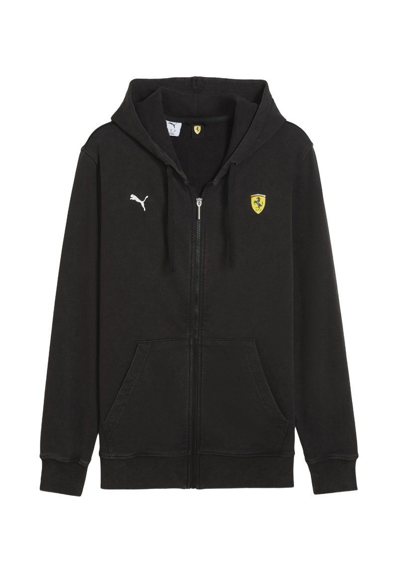 Sort zip-up hoodie med hætte, lavet af blødt stof. Har et hvidt Puma-logo og et gult Ferrari-skjold på brystet. Forlommer.