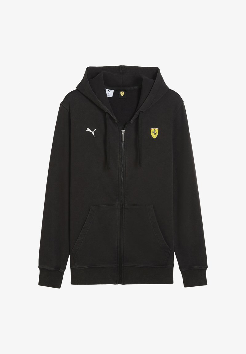 Sort zip-up hoodie med hætte, lavet af blødt stof. Har et hvidt Puma-logo og et gult Ferrari-skjold på brystet. Forlommer.