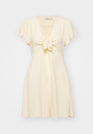 Short-sleeve, light yellow dress with a tie front. Soft, textured fabric, V-neckline, and flared skirt, offering a relaxed fit.