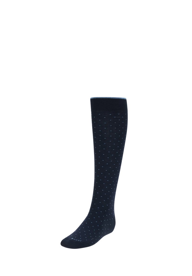 Calcetas azul marino hasta la rodilla con pequeños lunares de color azul claro. Elaboradas con un material suave y con un puño acanalado para mayor comodidad y ajuste.