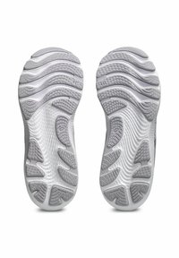 Grey and white athletic shoe soles with textured rubber patterns, grooves, and "AHAR" branding detail. Designed for traction and durability.