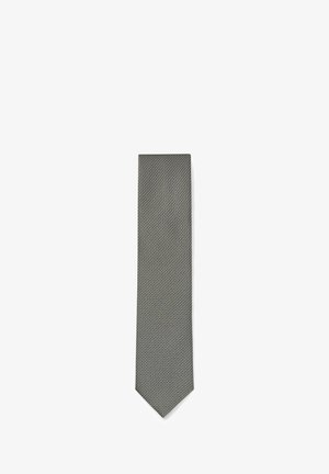 Gray necktie with a small white geometric dot pattern, classic pointed tip, laid flat on a white background.