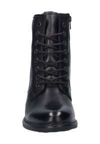 Bottines noires en cuir avec une texture lisse, dotées de lacets à l'avant, d'une fermeture éclair sur le côté et d'un bout arrondi. Profil élancé avec un design minimal.