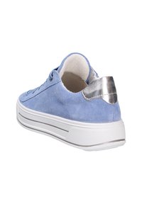 Blue suede sneaker with a textured upper, white rubber sole, and metallic silver accent at the heel. Features round laces and low-top design.