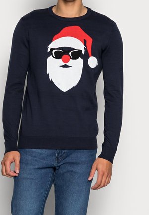 Marineblauer Strickpullover mit einem roten Weihnachtsmannhut und Sonnenbrillen-Motiv, das einen weißen Bart und eine rote Nase zeigt. Gerippte Bündchen und Saum.