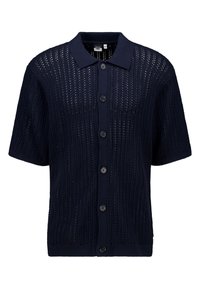 Laivastonsininen neulottu neuletakki, jossa on lyhyet hihat, nappikiinnitys edessä ja teksturoitu kuvio, jossa on pystysuoria raitoja ja avointa neulosta.