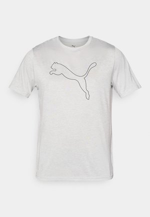 T-shirt branca de manga curta, feita de tecido suave, com um contorno preto de um logótipo de pantera a saltar na frente.