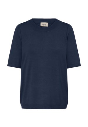 Meresinine kootud t-särk ümmarguse kaelusega, lühikeste varrukatega ja lahtise istuvusega. Valmistatud pehmest kangast, millel on sile tekstuur.