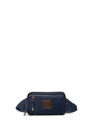 Marineblå taljepose med frontlomme med lynlås og justerbar rem, med et brunlædermærke med præget logo.