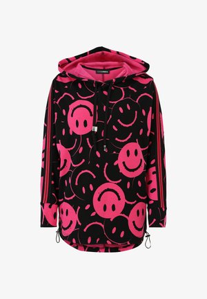 Black hoodie featuring large pink smiley face patterns. Includes a pink interior hood, drawstrings, and side zippers for a relaxed fit.