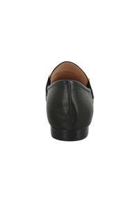 Mocassini in pelle nera con finitura liscia, retro arrotondato, rivestimento interno marrone e design minimalista. Presentano un tacco basso.