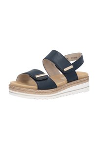 Navy leather sandals with two wide straps, gold-colored hardware, cushioned insole, and brown and white textured platform sole.