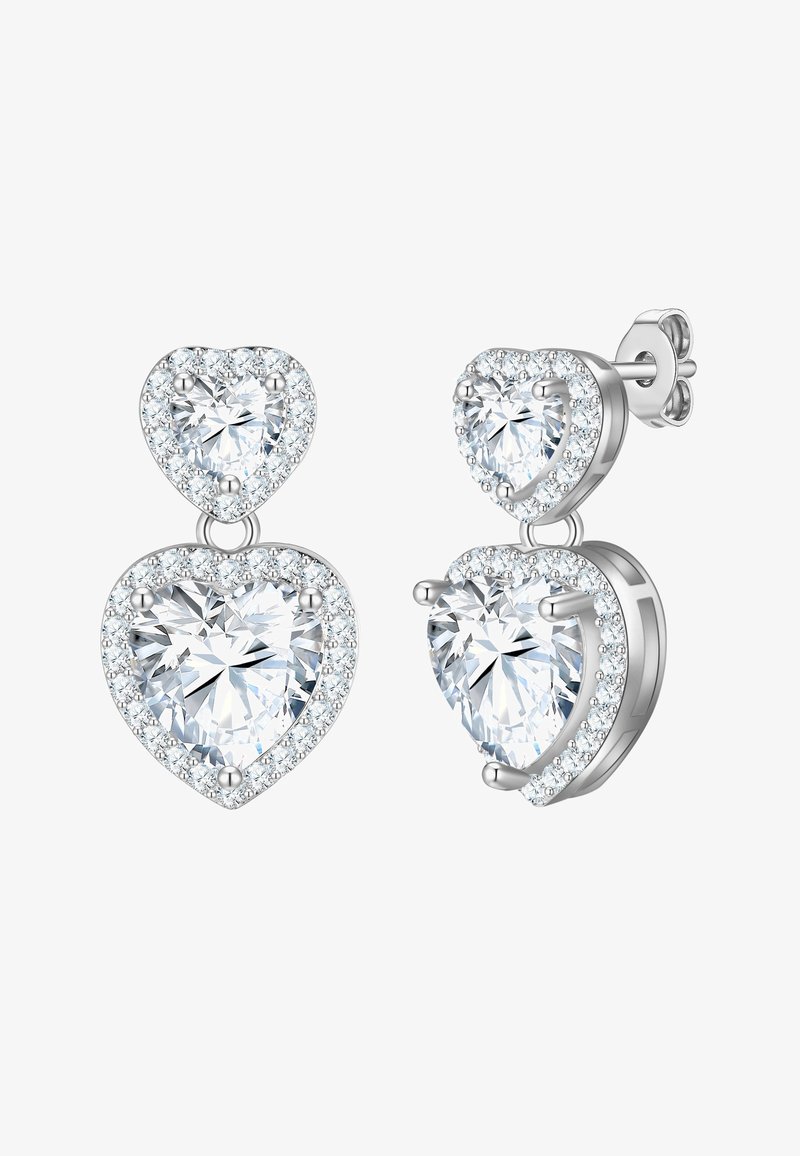 Širdies formos kabančios auskarai, kuriuose yra du skaidrūs akmenys, apsupti mažų blizgančių akmenukų. Pagaminti iš sidabro atspalvio metalo su poliruotu paviršiumi.