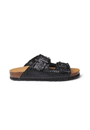 Sandalia deslizante negra tejida con dos correas ajustables, una plantilla de corcho y suela de goma texturizada. Presenta bordes redondeados sutiles y detalles cosidos.