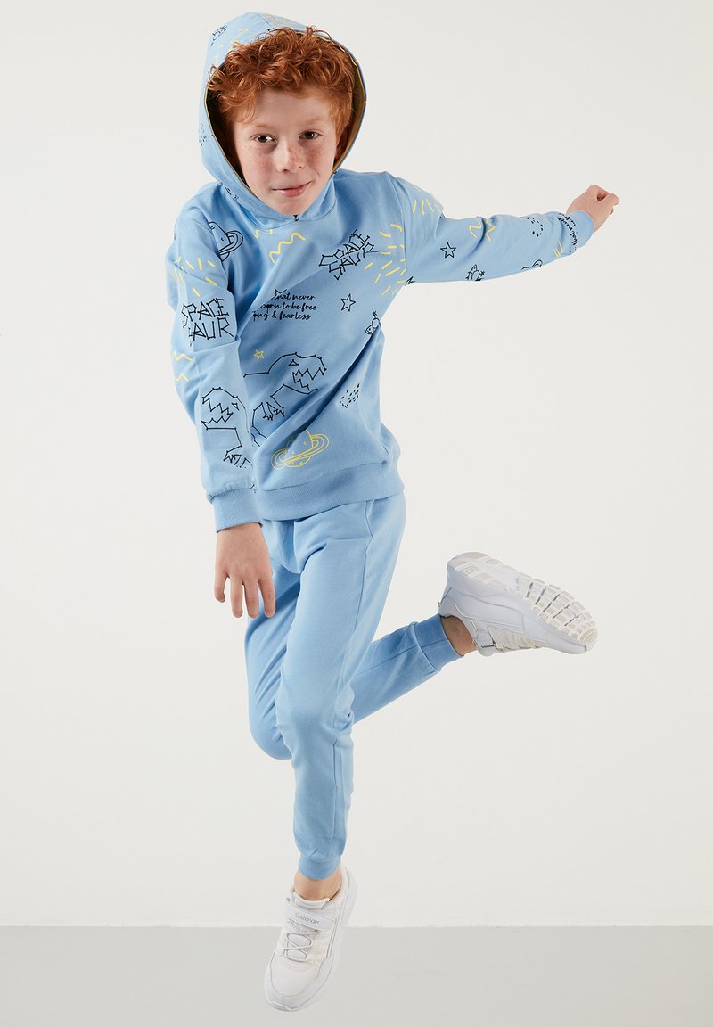 Costume tuta arancio da astronauta bambino