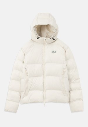 Puffer jacket in soft white with a fitted hood, zippered front, and two side pockets. Features a stitched pattern and a logo tag on the chest.
