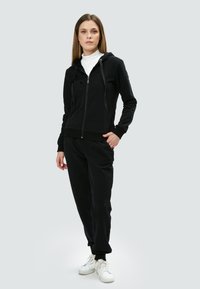 INFLUENCER LOGO EMBROIDERED - Jogginghose - black