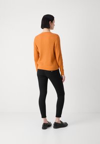 Tommy Hilfiger Casaco de malha - autumn orange