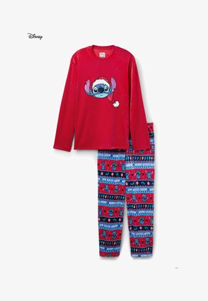 Pigiami per bambini con una maglia a maniche lunghe rossa con una grafica di Stitch e pantaloni blu con motivi natalizi in colori vivaci.