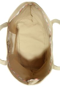 Vaaleanruskea kangaskassi, jossa on tilava sisätila. Merkittävä punainen ja sininen koristeommel yläreunassa. Sisältää sisätaskun.