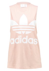 Ärmlös ljusrosa Adidas linne med stor vit trefoil-logotyp och "adidas" text framtill.