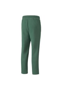 Grüne, mittellange Sporthosen mit einem elastischen Bund, zulaufenden Beinen und einer glatten Textur. Besitzt keine sichtbaren Taschen oder Verzierungen.