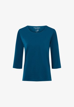 Teal, three-quarter sleeve cotton top with a round neckline and regular fit. Soft texture with a smooth finish, labeled with brand details.
