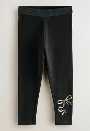 Leggings neri realizzati in tessuto elastico; presentano un nastro dorato lucido e il testo del marchio sul lato sinistro inferiore; vita elastica nella parte superiore.