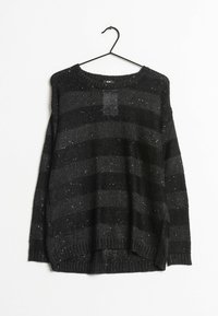 Černý a šedý pruhovaný svetr s volným, oversized střihem. Texturované pletení s jemným leskem. Dlouhé rukávy a široký výstřih.