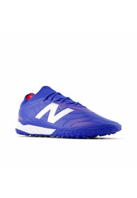 Blue athletic shoe with a textured synthetic upper, white logo detail, and rubber outsole featuring small tread patterns. Red interior accent.