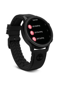 Čierny GPS smart hodiniek s guľatým ciferníkom a textúrovaným silikónovým remienkom. Displej zobrazuje možnosti pre chôdzu, beh a cyklistické cvičenia.