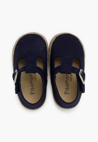 Navy blue children's shoes with canvas material, cut-out sides, and an adjustable strap with a silver buckle. Natural-colored espadrille sole.