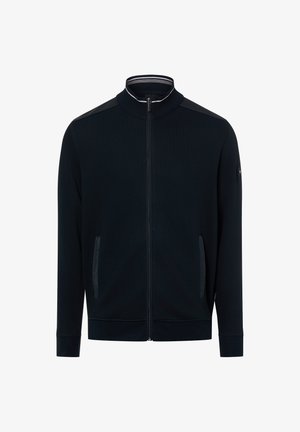 Granatowa kurtka na zamek z wysokim kołnierzem, bocznymi kieszeniami i ściągaczami na mankietach. Charakterystyczne kontrastowe detale na ramionach oraz gładka tekstura tkaniny.