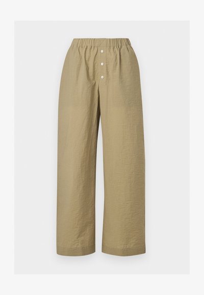 Μπεζ παντελόνια με φαρδιά πόδια, με ελαστική μέση και τρία λευκά κουμπιά στο μπροστινό μέρος, φτιαγμένα από ελαφρύ υφασμάτινο ύφασμα με υφή.