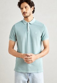 Marc O'Polo SHORT SLEEVE RIB COLLAR AND CUFFS SLITS AT HEM - Polotričko - midnight moss